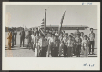[recto] Evacuees are staging a Boy Scout Memorial Day Service on May 30. ;  Photographer: McClelland, Joe ;  Amache, Colorado.