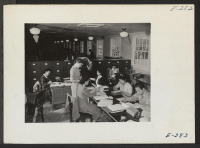 [recto] An interior view of the Personnel Records Section headed by Mrs. Nancy Damera. ;  Photographer: Parker, Tom ;  Denson, Arkansas.