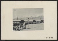 [recto] Manzanar, Calif.--Memorial Day services at Manzanar, a War Relocation Authority center where evacuees of Japanese ancestry will spend the duration. American Legion members and Boys Scouts participated in the services. ;  Photographer: Stewart, Francis