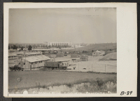 [recto] Pomona, Calif.-- General view of assembly center being constructed on Pomona Fair Grounds, for evacuees of Japanese ancestry. Evacuees will be assigned to War Relocation Authority centers for the duration. (See B-88 for rest of panorama.) ;  Photographe