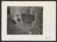 [recto] Evacuee property. A Japanese bathhouse. Practically every farm, formerly operated by evacuees, has a similar type bathhouse. ;  Photographer: Stewart, Francis ;  Loomis, California.