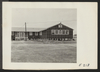 [recto] An exterior view of the hospital wing which is now in use. ;  Photographer: Parker, Tom ;  Denson, Arkansas.