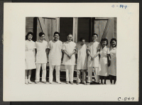 [recto] Manzanar, Calif.--Part of the dental clinic staff at this War Relocation Authority center for evacuees of Japanese ancestry. The entire staff is of Japanese descent. ;  Photographer: Lange, Dorothea ;  Manzanar, California.