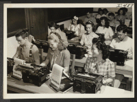 [recto] You are about to witness a fine example of democracy, Principal Harry McMillan informed the typing class at Southeast High ...