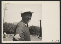 [recto] Near Mission San Jose, Calif.--Irrigator of Japanese ancestry on a farm, prior to evacuation. ;  Photographer: Lange, Dorothea ;  Mission San Jose, California.