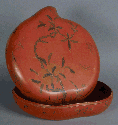 Large sweatmeat container with lid; peach design; shaped like peach
