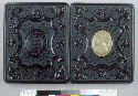 Before treatment: open thermoplastic union case exterior, showing front and back covers. (Scanned from a 35mm slide.)