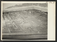 [recto] New Year's Fair. Model of camp 2, prepared for agricultural exhibit [by] evacuee craftsmen. ;  Photographer: Stewart, Francis ;  Poston, Arizona.