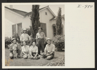 [recto] A group enjoying a rest during their noon hour on the lawn of the Yamada residence at Rt. 1, Box ...