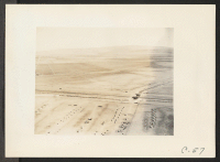 [recto] Tule Lake, Calif.-- A panoramic view showing site of Tule Lake War Relocation Authority center. (See also nos. C-56, C-58, and C-59 for complete panorama.) ;  Photographer: Albers, Clem ;  Newell, California.