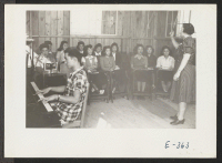 [recto] A Music Class. Vocal lessons are taught by Miss Leola Parsley. ;  Photographer: Parker, Tom ;  McGehee, Arkansas.