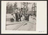[recto] Volunteer workers are here constructing apartments for the administrative staff. ;  Photographer: Parker, Tom ;  McGehee, Arkansas.