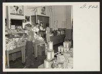 [recto] The Cooperative store at the Windsor Locks Housing project at Windsor Locks, Connecticut. ;  Photographer: Van Tassel, Gretchen ;  Windsor Locks, Connecticut.