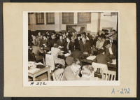[recto] Residents of Japanese ancestry registering prior to evacuation. Evacuees are housed temporarily at assembly points and later transferred to War Relocation Authority centers for the duration. ;  Photographer: Albers, Clem ;  San Francisco, California.