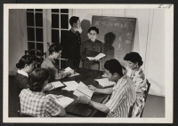 [recto] Mrs. Hasegawa teaches the Japanese language to students at the Quaker graduate school, Pendle Hill, Wallingford, Pa. Her husband, Mr. ...