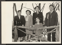 [recto] Mr. and Mrs. Joe Tsuji, formerly of Granada and Los Angeles, shown with their two daughters and Mrs. Leslie Smith, ...
