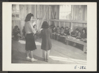 [recto] The third Grade class in the temporary elementary school in barracks 35-6-F. Teacher: Tokio Inouye. ;  Photographer: Parker, Tom ;  McGehee, Arkansas.