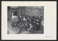 [recto] Kindergarten class in barracks 35-4-F. Shigeko Tabuchi, teacher. ;  Photographer: Parker, Tom ;  McGehee, Arkansas.