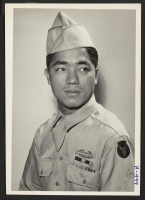 [recto] Pfc. Thomas Higa, 28-year-old Japanese-American veteran of the campaign in Italy and a proud member of the famous 100th Infantry ...