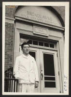 [recto] Dr. Tom Abe is resident physician and clinical director in Broadlawns, Polk County Hospital. Here he is shown standing in ...
