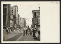 [recto] Washington Street scene in busy downtown Indianapolis. ;  Photographer: Mace, Charles E. ;  Indianapolis, Indiana.