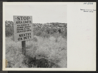 [recto] One of the many boundary signs posted around the Tule Lake Center. ;  Photographer: Mace, Charles E. ;  Newell, California.