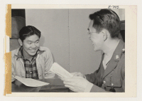 [recto] Sergeant Fred H. Odanaka, only Japanese-American member of the special Army recruiting team sent to the Granada Relocation Center to ...