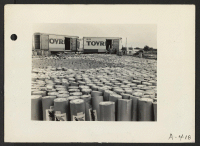 [recto] Poston, Arizona --Roofing material which will be used in the construction of living quarters for evacuees of Japanese ancestry at the Colorado River War Relocation center. ;  Photographer: Clark, Fred ;  Poston, Arizona.