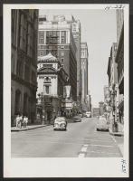 [recto] A typical street in the business section of Kansas City, Missouri. ;  Photographer: Mace, Charles E. ;  Kansas City, Missouri.