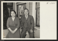 [recto] Mr. and Mrs. Sasaki (former Minidoka residents) in their home at 313 Eighteenth Avenue in Seattle, Washington. They have one son in France and another who recently received a medical discharge, and who is living with them in Seattle. ;  Photographer: Iw