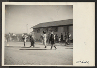 [recto] Participants of Japanese ancestry who participated in the Harvest Festival Parade held at this center on Thanksgiving day. ;  Photographer: Stewart, Francis ;  Rivers, Arizona.