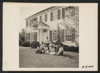 [recto] The Shibuya family on the lawn in front of their beautiful home before evacuation to War Relocation Authority centers. There ...