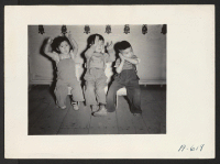 [recto] Nursery school children singing Twinkle, Twinkle, Little Star. ;  Photographer: Stewart, Francis ;  Newell, California.
