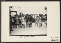 [recto] Evacuees of Japanese ancestry boarding a bus which will take them to the Santa Anita Assembly Center. They will later be transferred to a War Relocation Authority Center to spend the duration. ;  Photographer: Albers, Clem ;  Salinas, California.