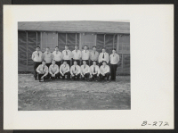[recto] A group picture, showing supervisors and field supervisors from the warden's office, at this relocation center. ;  Photographer: Stewart, Francis ;  Newell, California.
