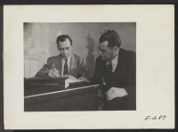[recto] Paul A. Taylor, Project Director, and W. C. Melton, Assistant Project Director. ;  Photographer: Parker, Tom ;  Denson, Arkansas.