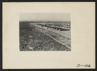 [recto] Eden, Idaho--A panorama view of the Minidoka War Relocation Authority center. This view, taken from the top of the water tower at the east end of the center, shows partially completed barracks. ;  Photographer: Stewart, Francis ;  Hunt, Idaho.