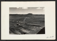 [recto] Tule Lake, Calif.--Bird's-eye view of War Relocation Authority center. ;  Photographer: Albers, Clem ;  Newell, California.