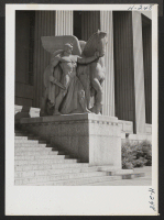 [recto] Classic sculptured figures at the entrance to the Soldiers Memorial and Memorial Plaza in St. Louis. ;  Photographer: Mace, Charles E. ;  St. Louis, Missouri.