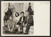 [recto] Here are Professor Obata and his family in the living room of their home in Webster Groves. At the left ...