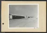 [recto] Poston, Ariz.--(Site #3)-- Barracks in Site 3 are nearing completion at this War Relocation Authority center for evacuees of Japanese ancestry. ;  Photographer: Clark, Fred ;  Poston, Arizona.