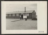 [recto] An exterior view of the Employment Office. ;  Photographer: Parker, Tom ;  Denson, Arkansas.