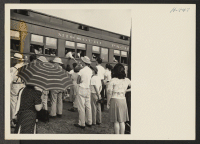 [recto] Closing of the Jerome Center, Denson, Arkansas. Scene at the tracks as the June 19th train left Jerome for Granada. ;  Photographer: Mace, Charles E. ;  Denson, Arkansas.