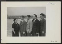 [recto] (Left to right) Mrs. Misa Sakura, mother of the four Sakura brothers, Ted, Kenny, Chester and Howard. The boys have ...