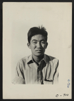 [recto] Manzanar, Calif.--Ogura Shuichi, 22, born in Pasadena. He attended Pasadena Junior College and was a visiting student at the California ...