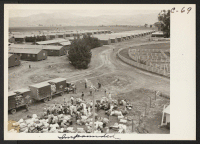 [recto] Panorama of Salinas Assembly Center. Persons of Japanese ancestry, evacuated from coastal areas, were held first in assembly centers before being assigned to relocation centers further inland. ;  Photographer: Albers, Clem ;  Salinas, California.