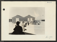[recto] Poston, Ariz. (Site #1)--Evacuees of Japanese ancestry spending their first day at this War Relocation Authority center. ;  Photographer: Clark, Fred ;  Poston, Arizona.