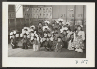 [recto] Clever costumes worn by the nursery school children during the Labor Day celebration. ;  Photographer: Stewart, Francis ;  Newell, California.