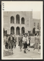 [recto] Nisei students arriving on the campus at the University of California in Los Angeles. In the foreground is Michiko Kataoka. ...