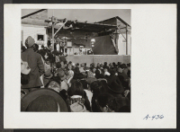 [recto] A scene at the Harvest Festival held at this relocation center. ;  Photographer: Stewart, Francis ;  Newell, California.